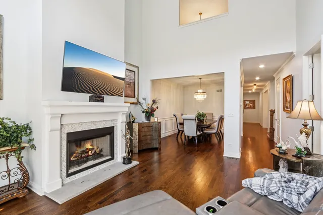 a living room with furniture fireplace and flat screen