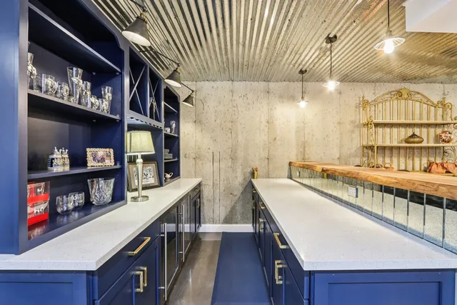 a dining room with furniture and a book shelf