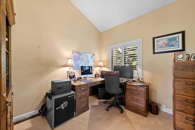 a bathroom with a double vanity sink mirror and toilet