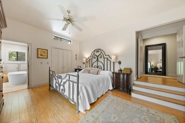 a bathroom with a sink double vanity and a mirror