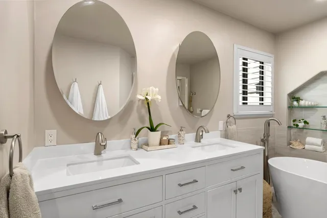 a view of a livingroom with workspace and a window