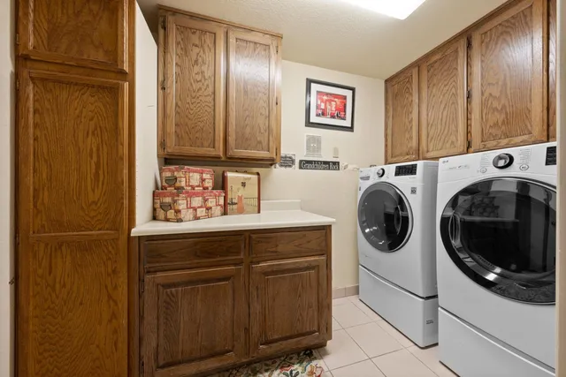 a view of a balcony with wooden floor and wooden fence