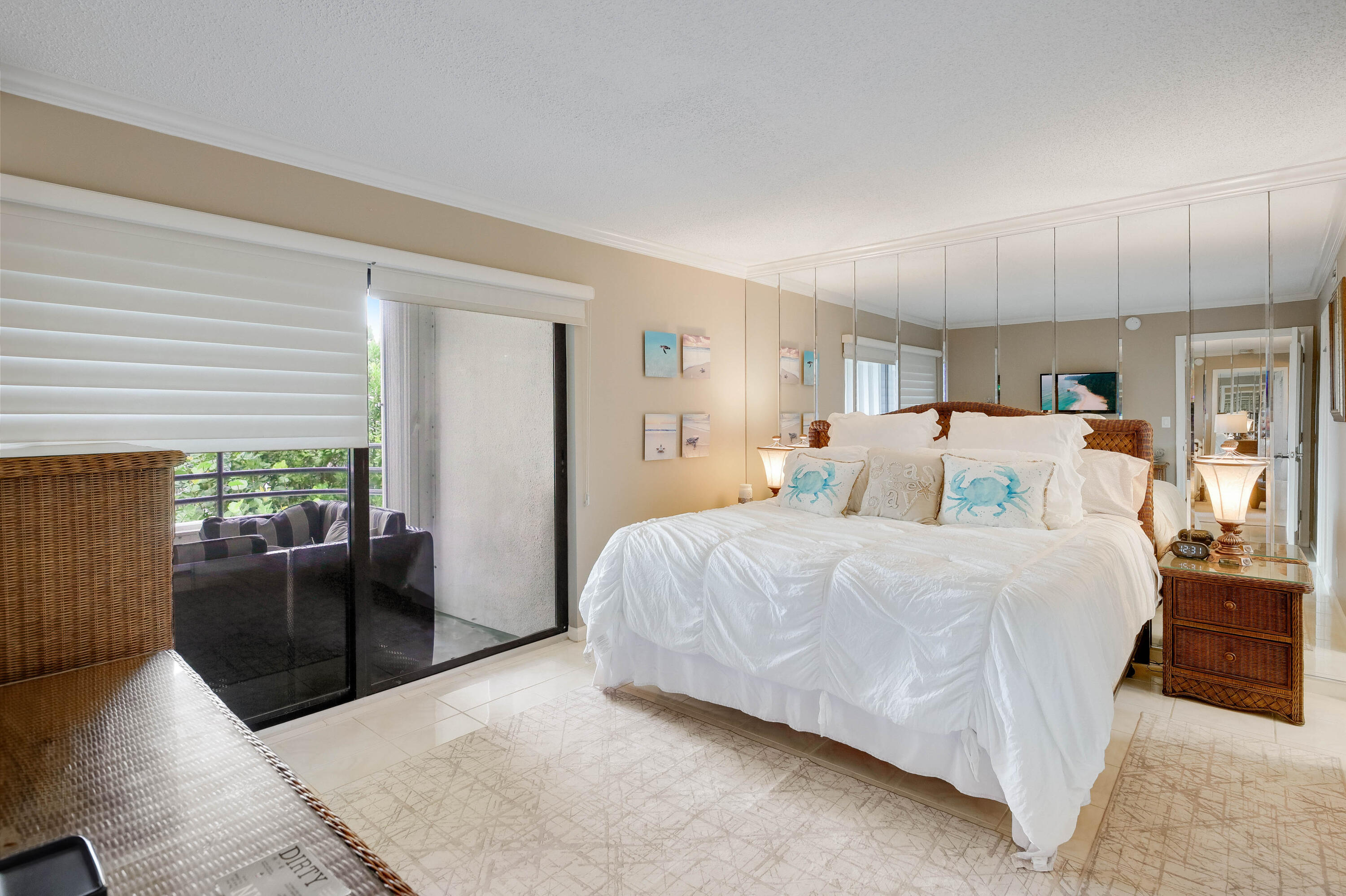 420 Celestial Way, Unit 204 Juno Beach, FL 33408 - Photo 16 of 35 a bed room with a bed and a couch