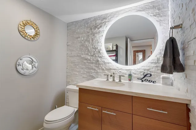 a bathroom with a toilet and a sink