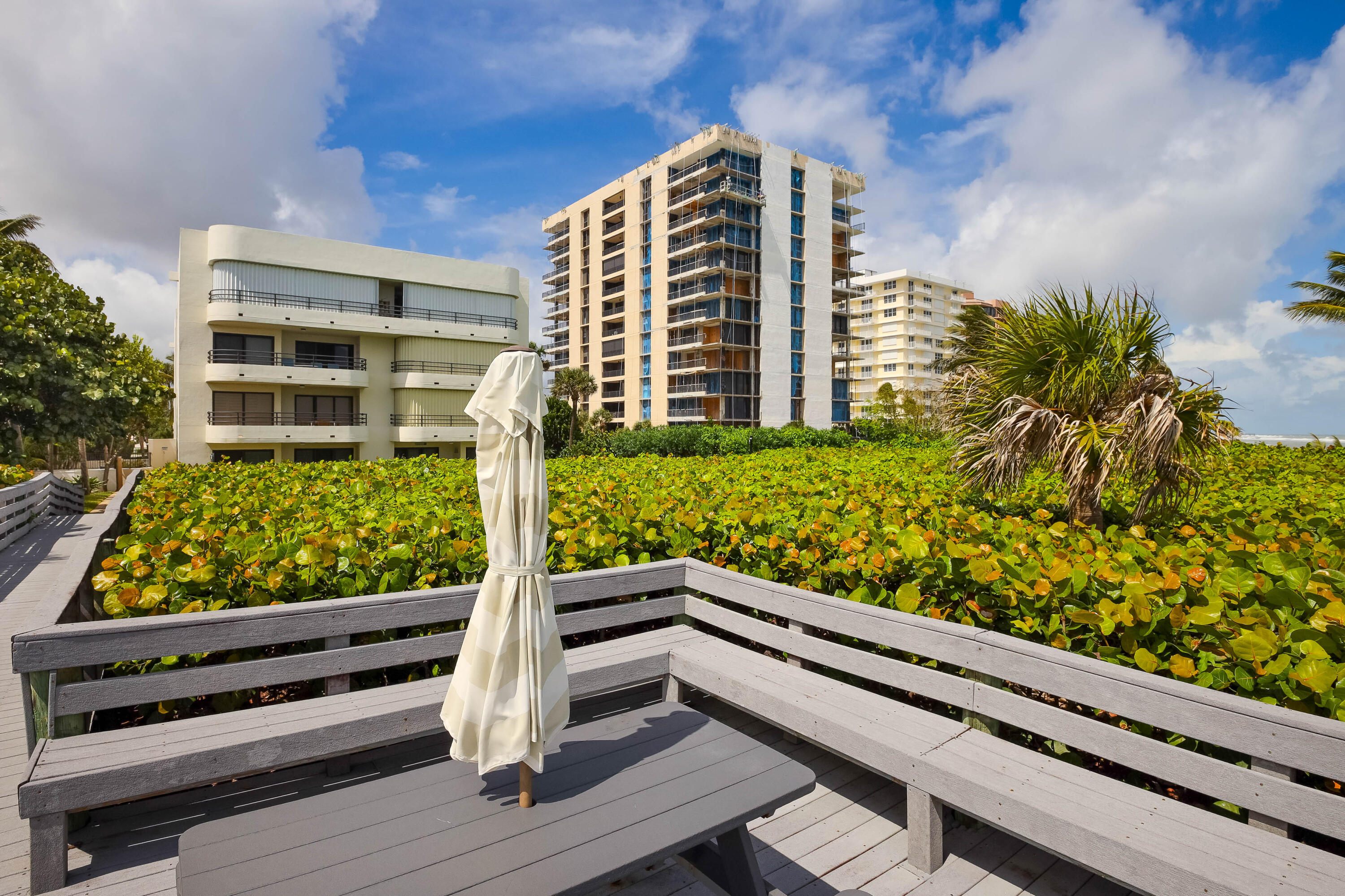420 Celestial Way, Unit 204 Juno Beach, FL 33408 - Photo 28 of 35 a view of building from balcony