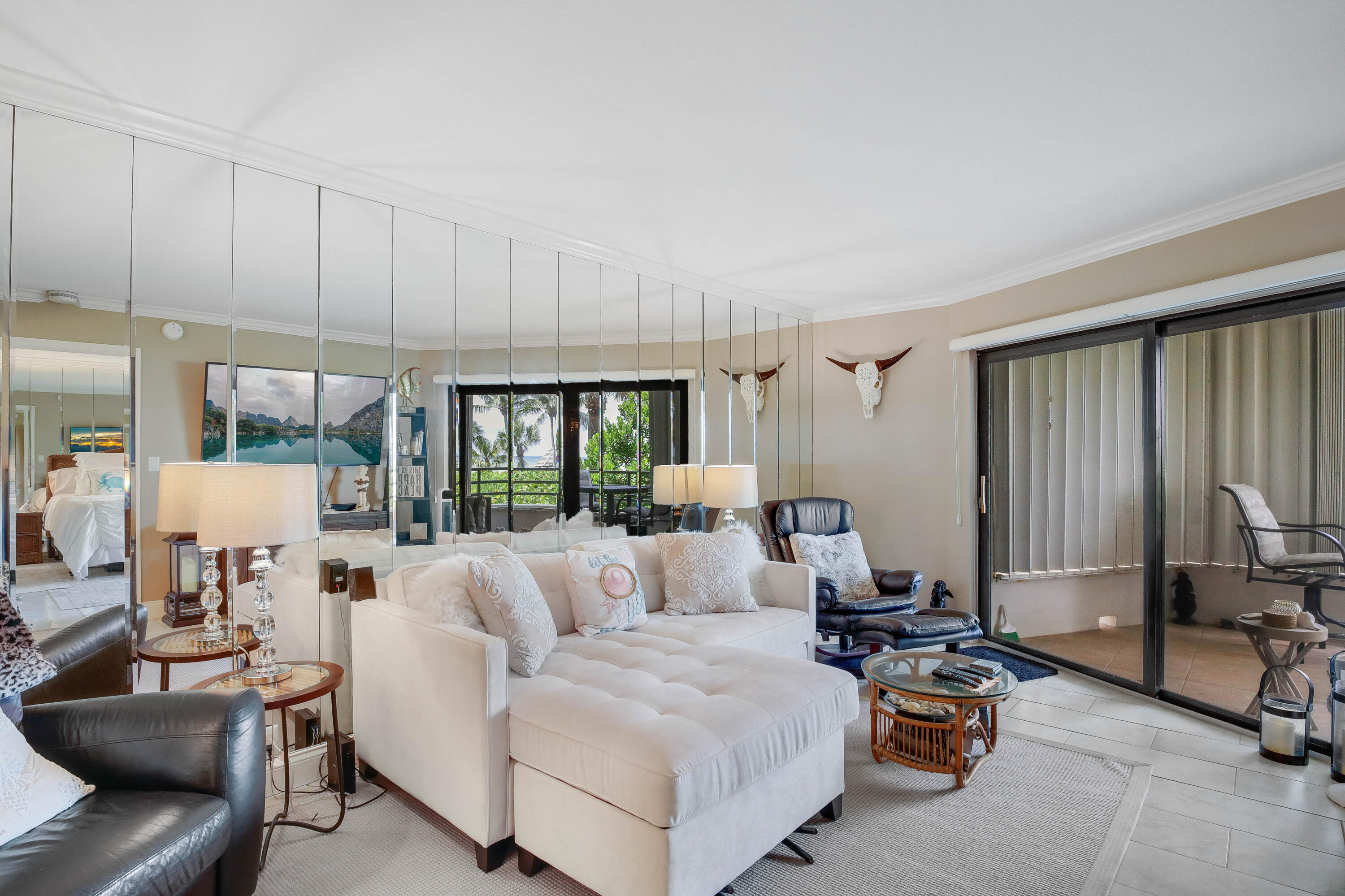 420 Celestial Way, Unit 204 Juno Beach, FL 33408 - Photo 5 of 35 a living room with furniture and a large window