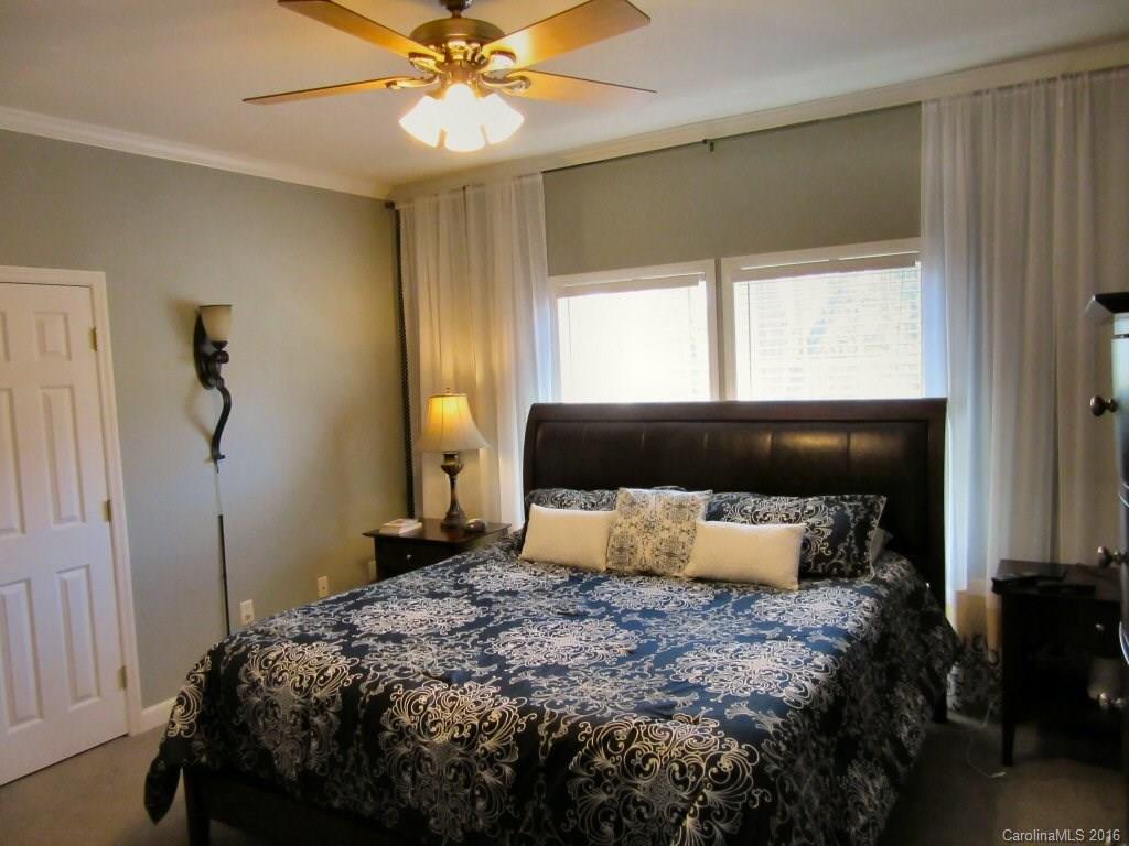 115 Coltons Way, Unit 2 Penrose, NC 28766 - Photo 8 of 14 a bedroom with a bed and window
