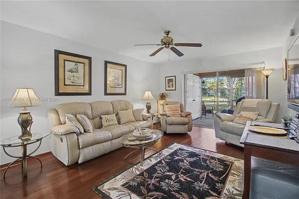 a living room with furniture or couch and a window