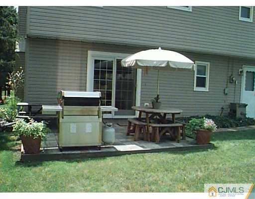 55 Ellison Road Somerset, NJ 08873 - Photo 5 of 8 a view of a house with backyard