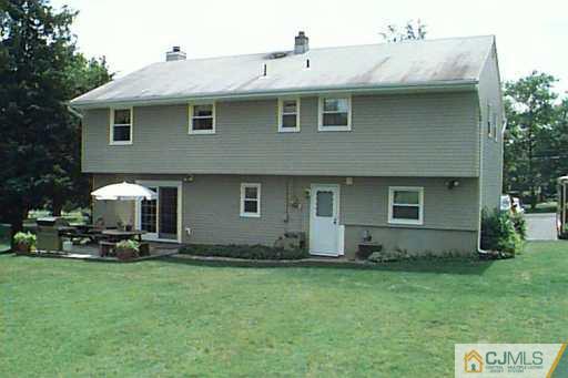 55 Ellison Road Somerset, NJ 08873 - Photo 8 of 8 a front view of a house with a yard