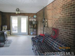 516 Mt Torrey Road Lyndhurst, VA 22952 - Photo 3 of 9 a living room with furniture and a chandelier