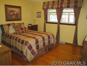 516 Mt Torrey Road Lyndhurst, VA 22952 - Photo 4 of 9 a bedroom with a bed and a window