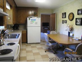 516 Mt Torrey Road Lyndhurst, VA 22952 - Photo 5 of 9 a view of kitchen island with furniture and wooden floor
