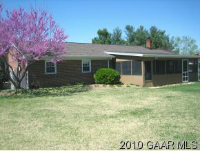 516 Mt Torrey Road Lyndhurst, VA 22952 - Photo 7 of 9 a backyard of a house with plants and garden
