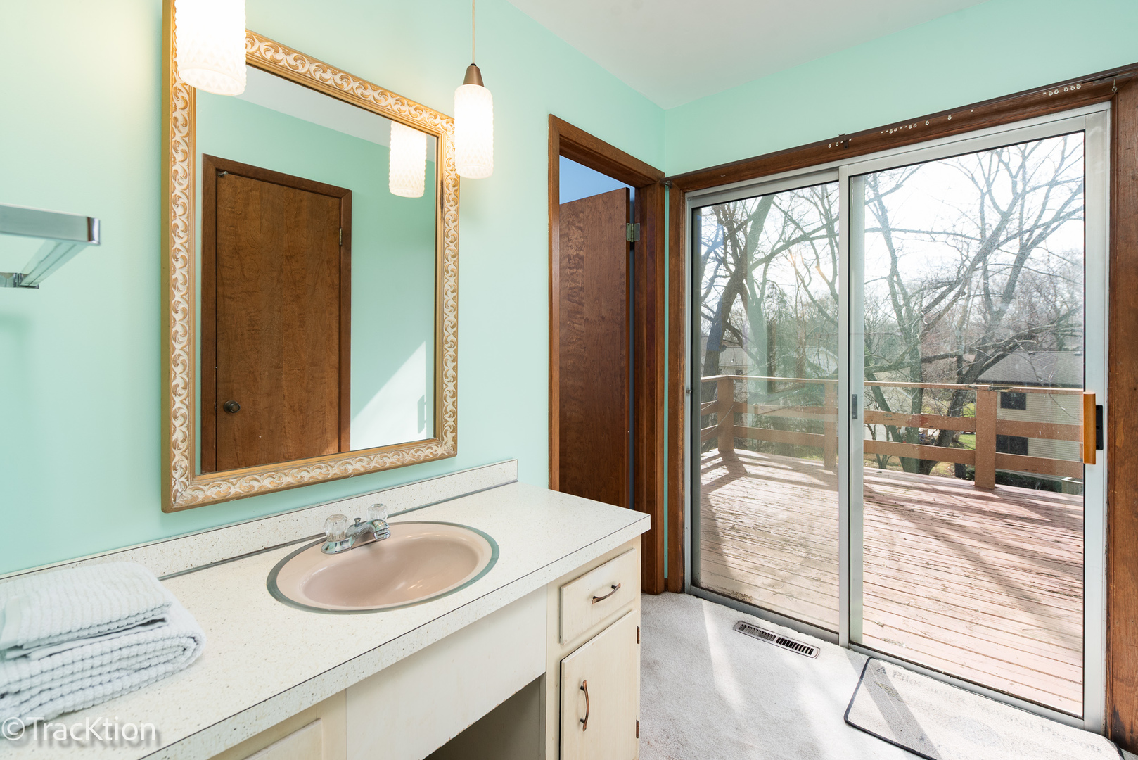 249 Surrey Road Bartlett, IL 60103 - Photo 13 of 28 a bathroom with a granite countertop sink and a mirror