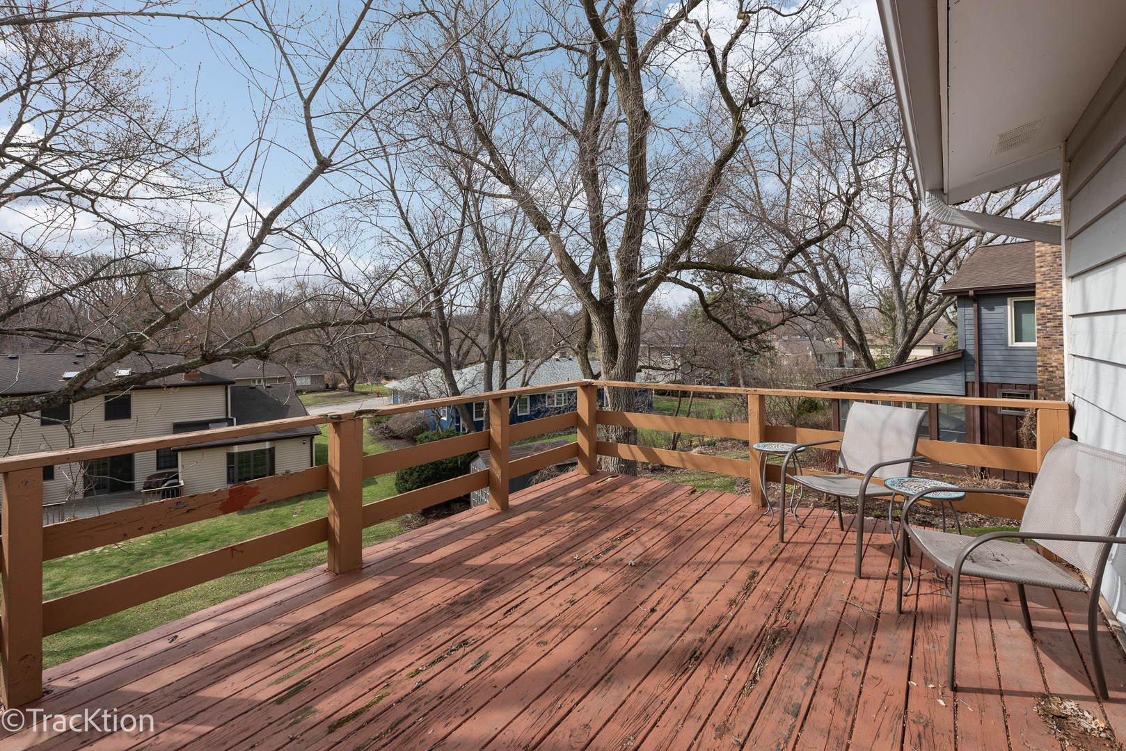 249 Surrey Road Bartlett, IL 60103 - Photo 14 of 28 a roof deck with wooden floor and fence
