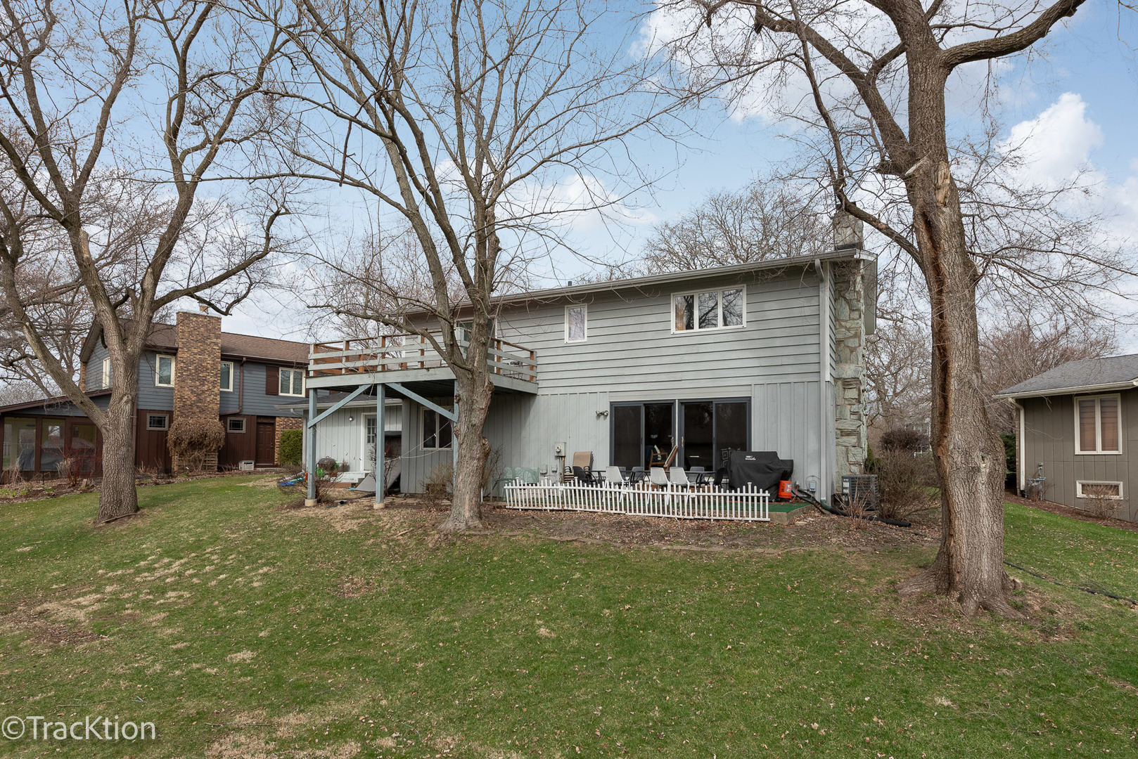 249 Surrey Road Bartlett, IL 60103 - Photo 23 of 28 a front view of house with yard and seating area