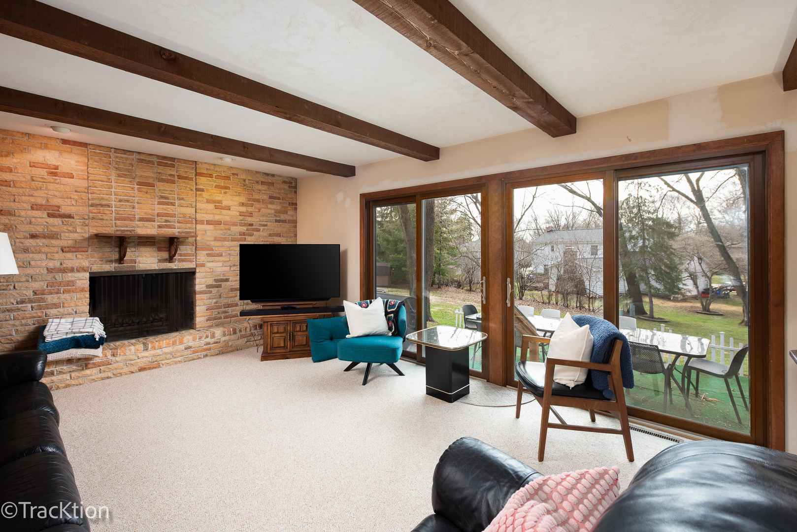 249 Surrey Road Bartlett, IL 60103 - Photo 7 of 28 a living room with furniture tv and a flat screen tv