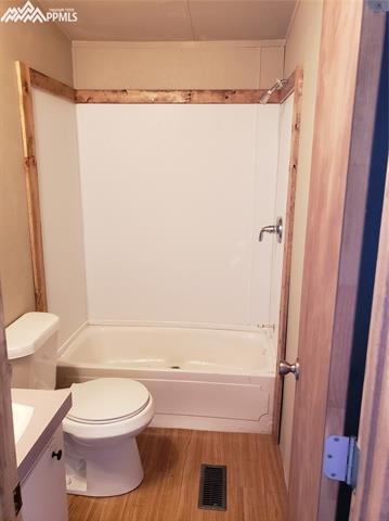 29965 Elway Point Yoder, CO 80864 - Photo 10 of 13 Hall bathroom with tub/shower combo.