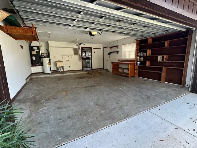 a view of a garage with chairs