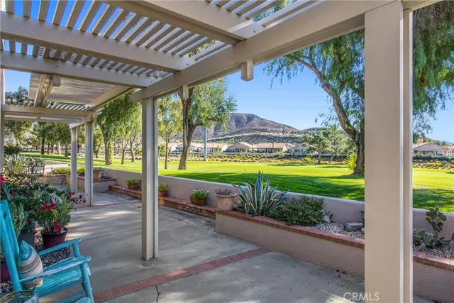 a view of a swimming pool with garden