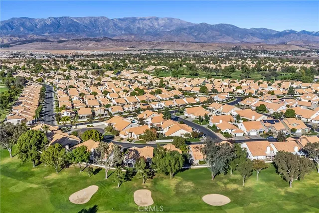 a view of a city with a lake