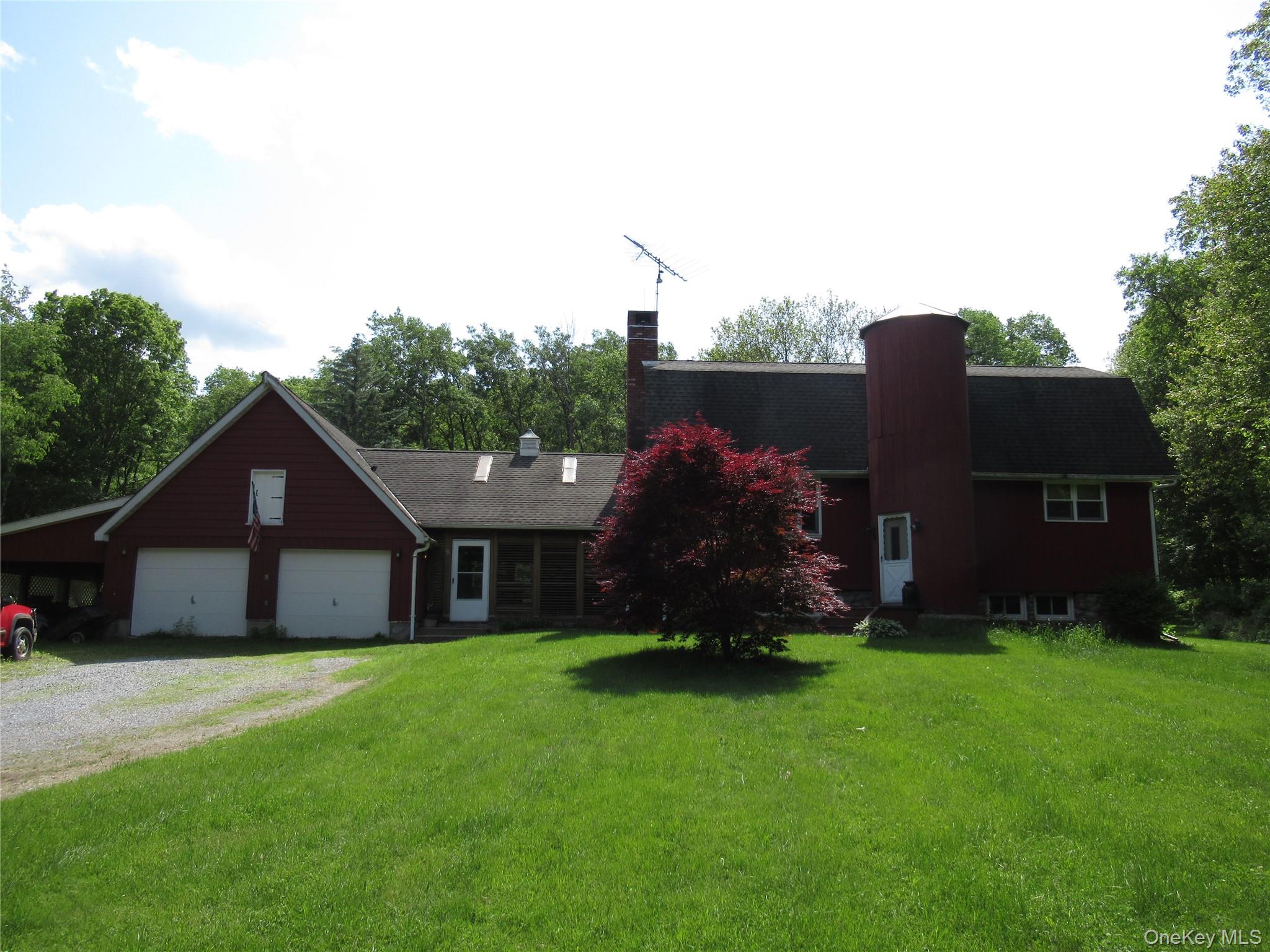 43 High View Road Dover Plains, NY 12522 - Photo 1 of 1 a view of a house with a yard and a garden