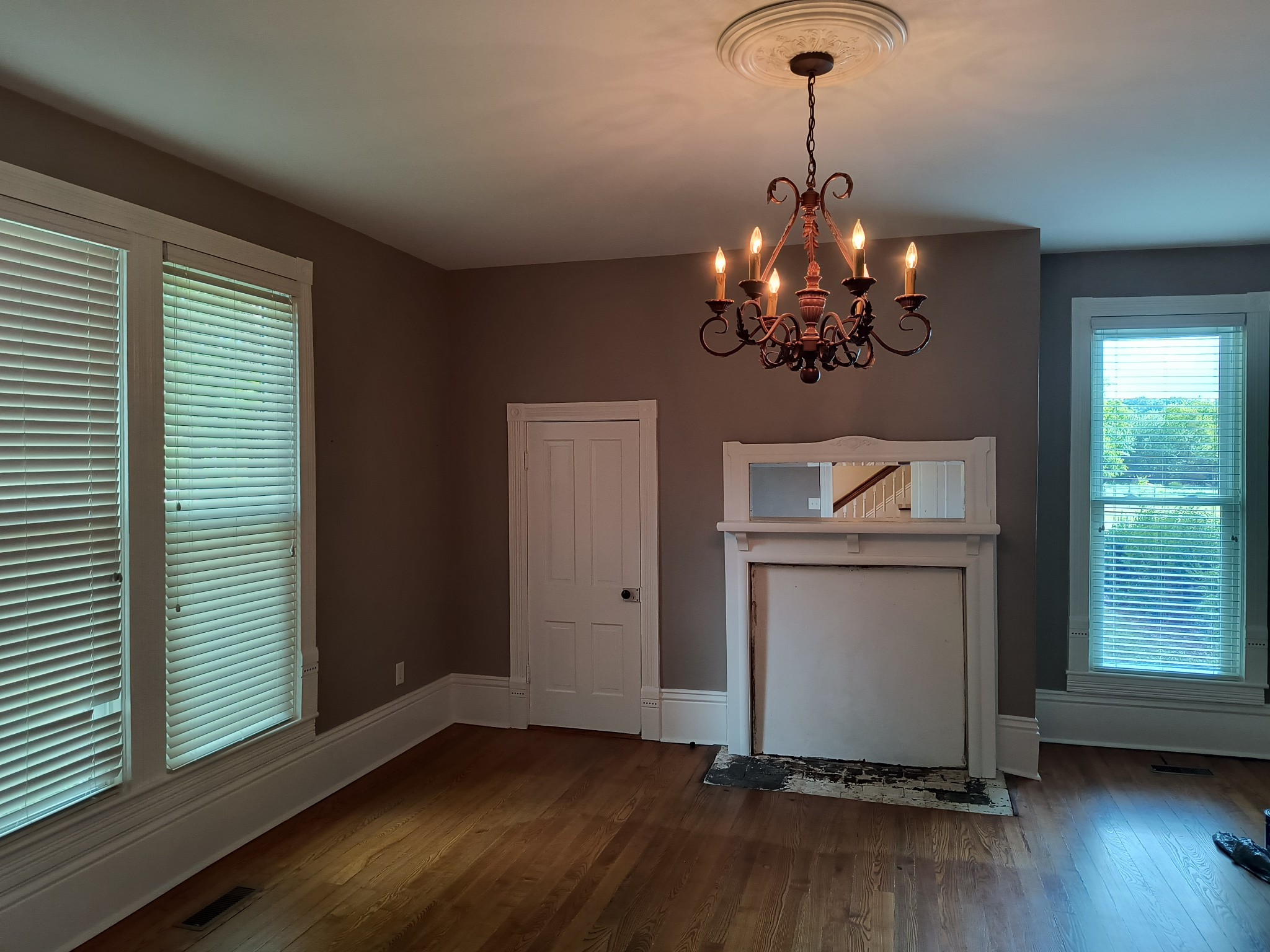 3460 Big Springs Road Lebanon, TN 37090 - Photo 12 of 74 a view of a room with wooden floor chandelier and windows