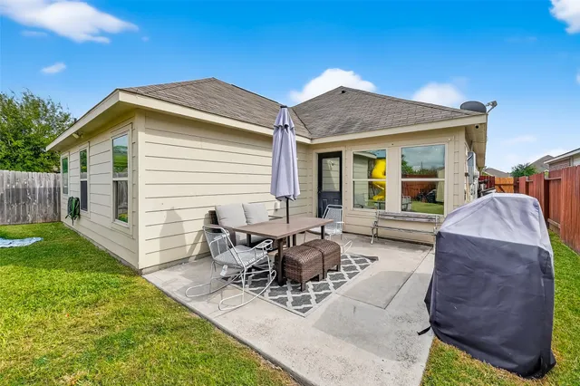 a view of a house with patio