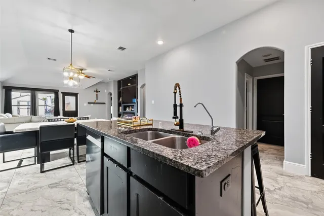 a very nice looking dining room with a table and chairs