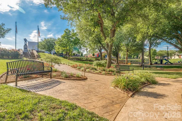 a view of a park with swings