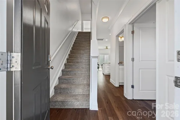 a view of entryway with wooden floor