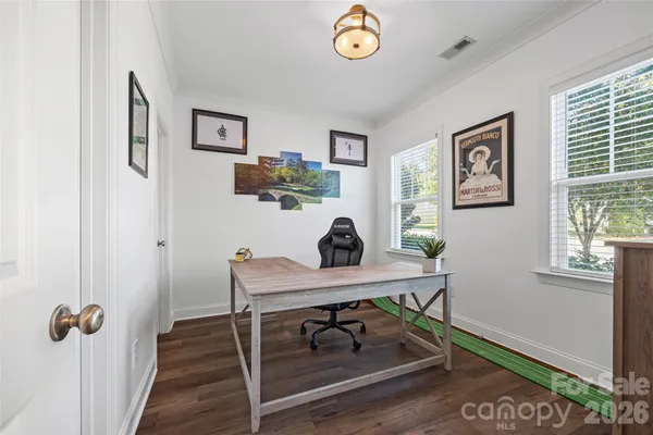 a workspace with furniture and window