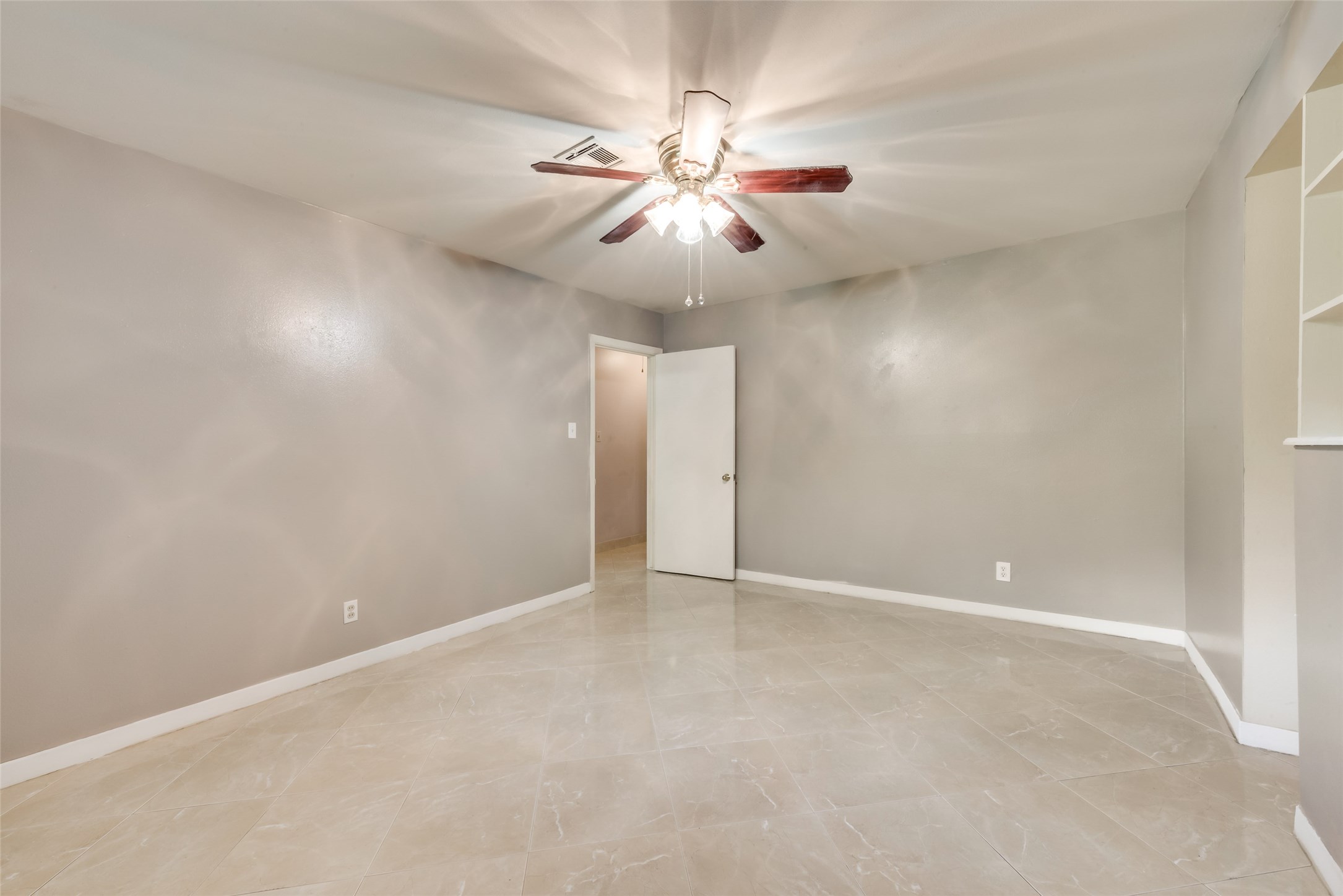 1522 Baggett Lane, Unit A Houston, TX 77055 - Photo 12 of 29 en view of an empty room