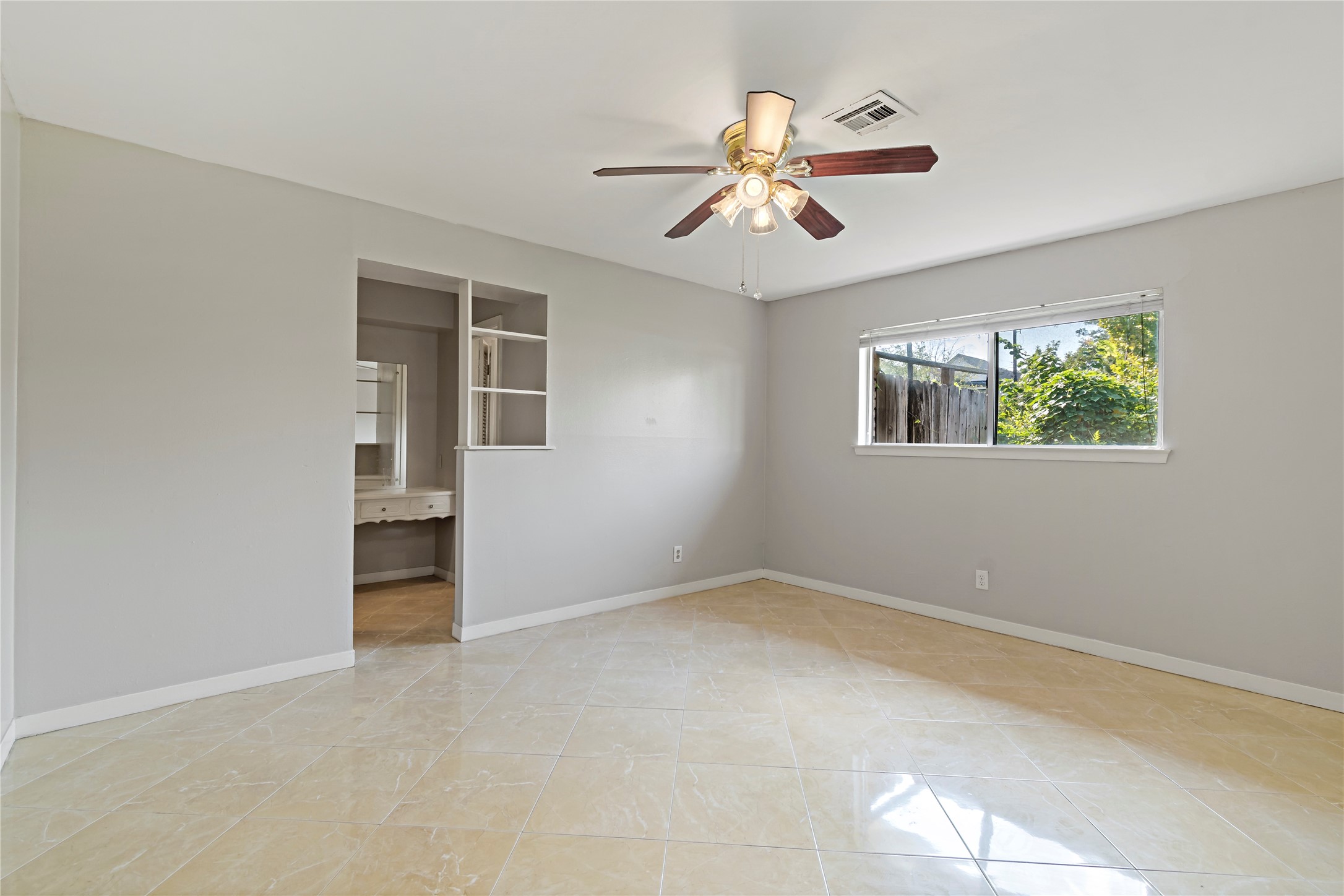 1522 Baggett Lane, Unit A Houston, TX 77055 - Photo 21 of 29 a view of an empty room with a window