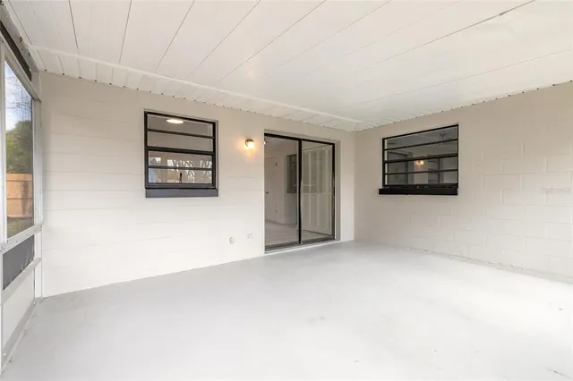 an empty room with windows