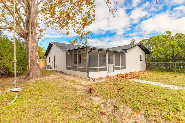 a house with trees in front of it