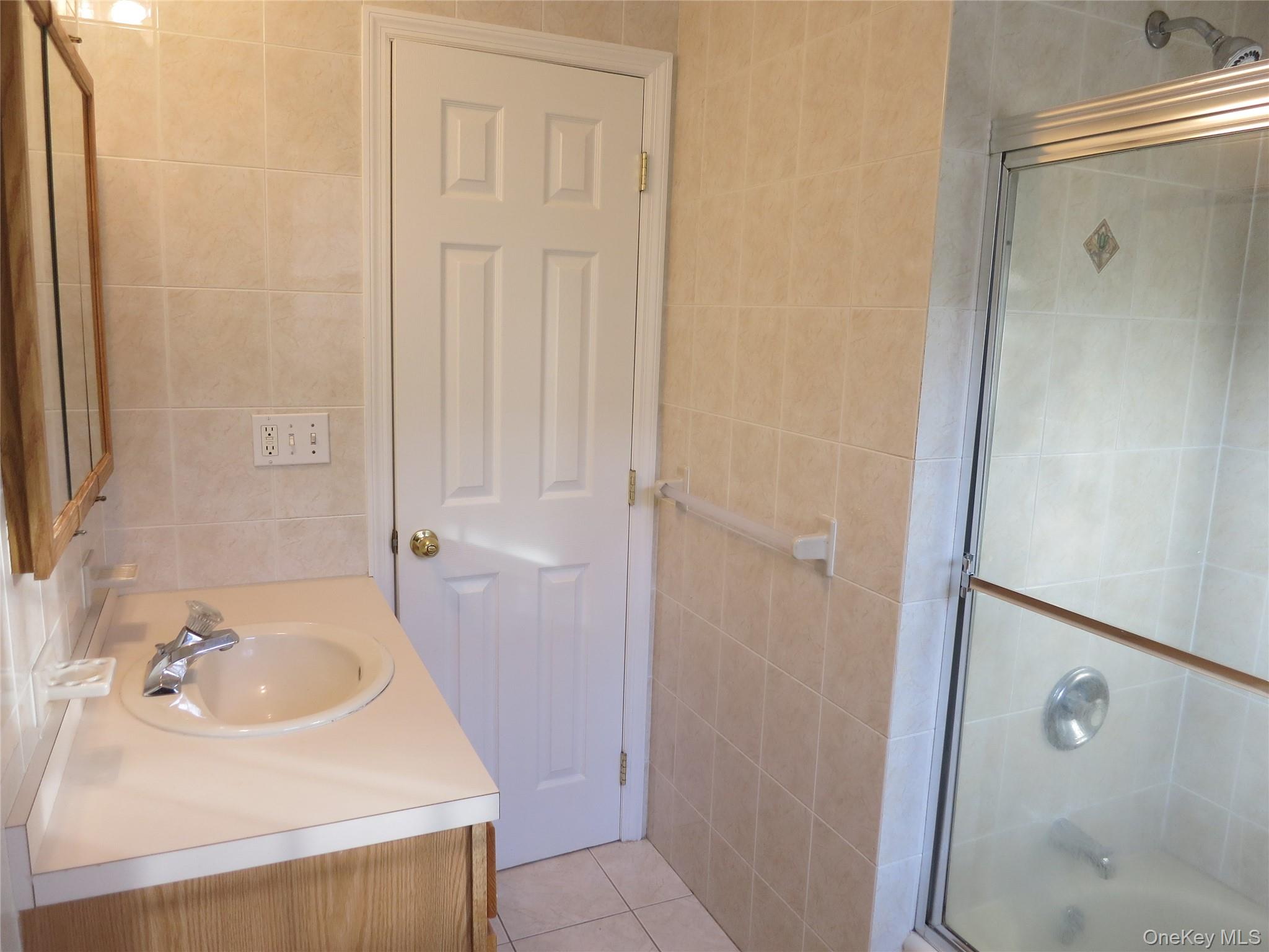 56 Linwood Road North, Unit 2 Port Washington, NY 11050 - Photo 10 of 11 hallway bathroom
