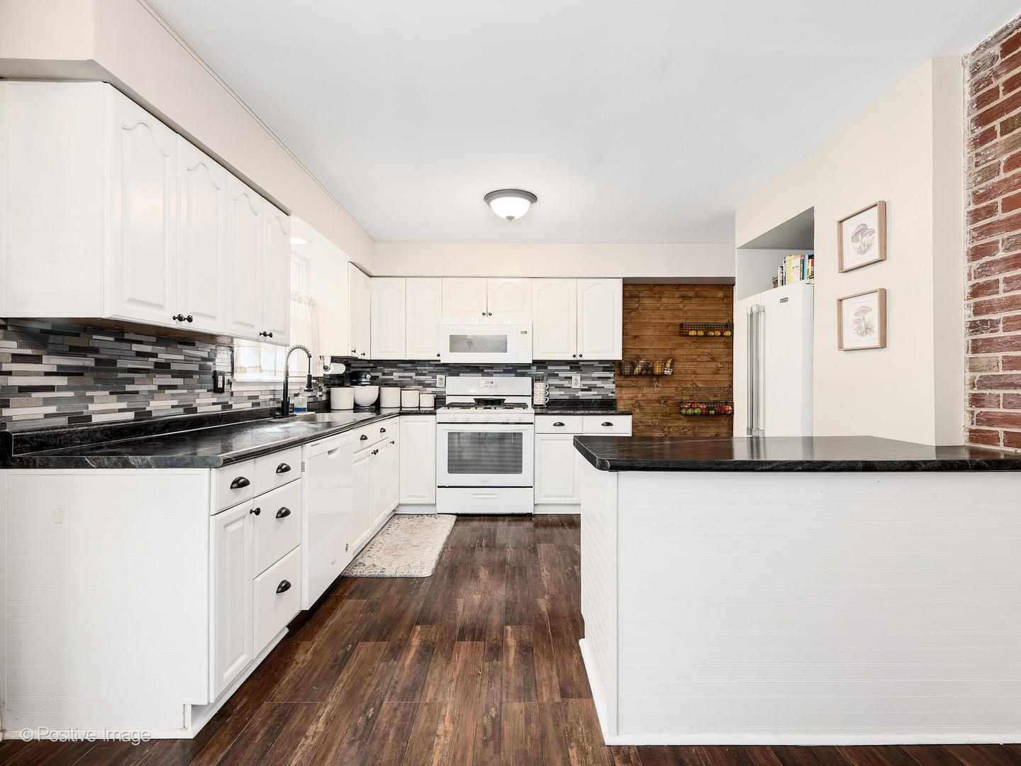 2 Sunset Lane Algonquin, IL 60102 - Photo 9 of 18 a large white kitchen with stainless steel appliances