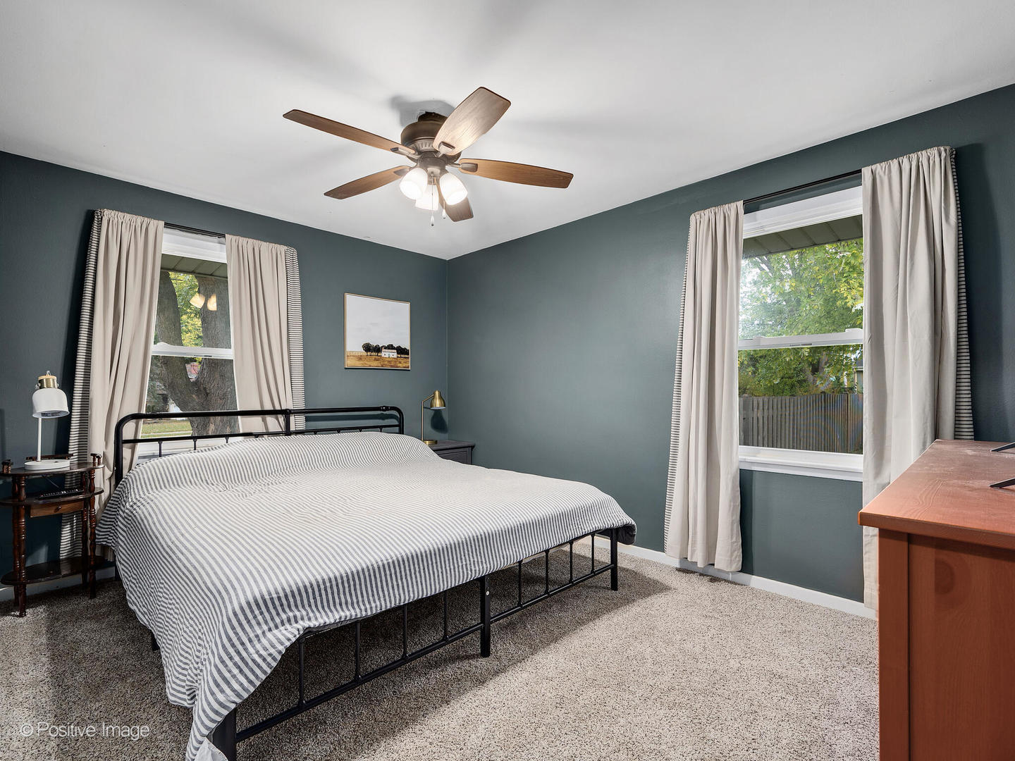 2 Sunset Lane Algonquin, IL 60102 - Photo 10 of 18 a bedroom with a large bed and a chandelier