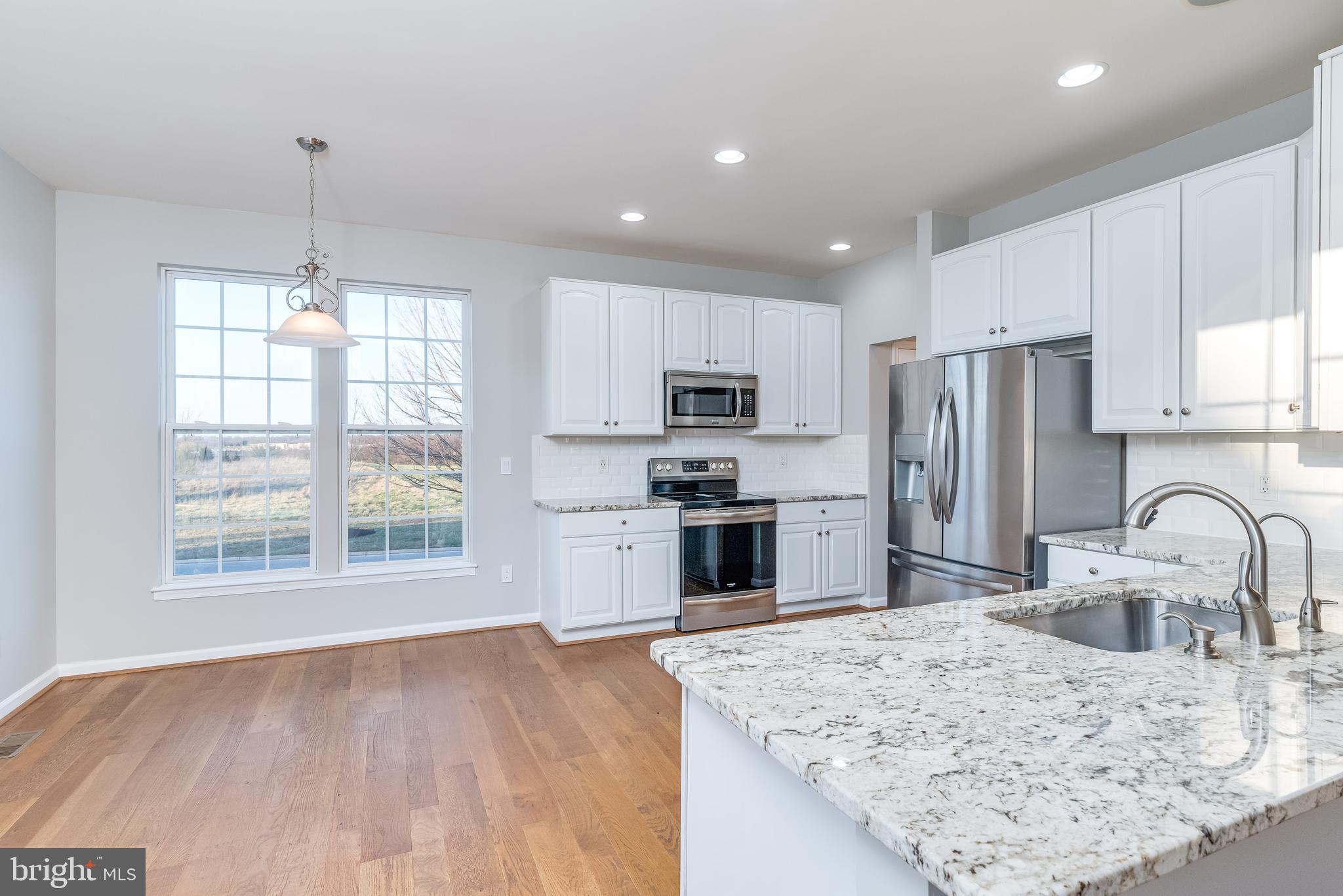 1357 North Fairfax Boulevard Ranson, WV 25438 - Photo 14 of 51 Large windows let in tons of natural light