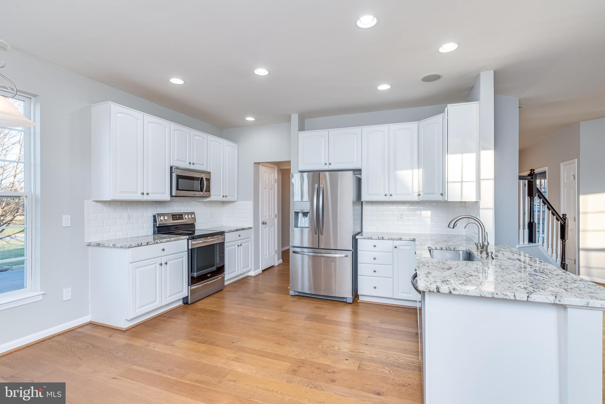 1357 North Fairfax Boulevard Ranson, WV 25438 - Photo 15 of 51 Kitchen features the same beautiful hardwoods