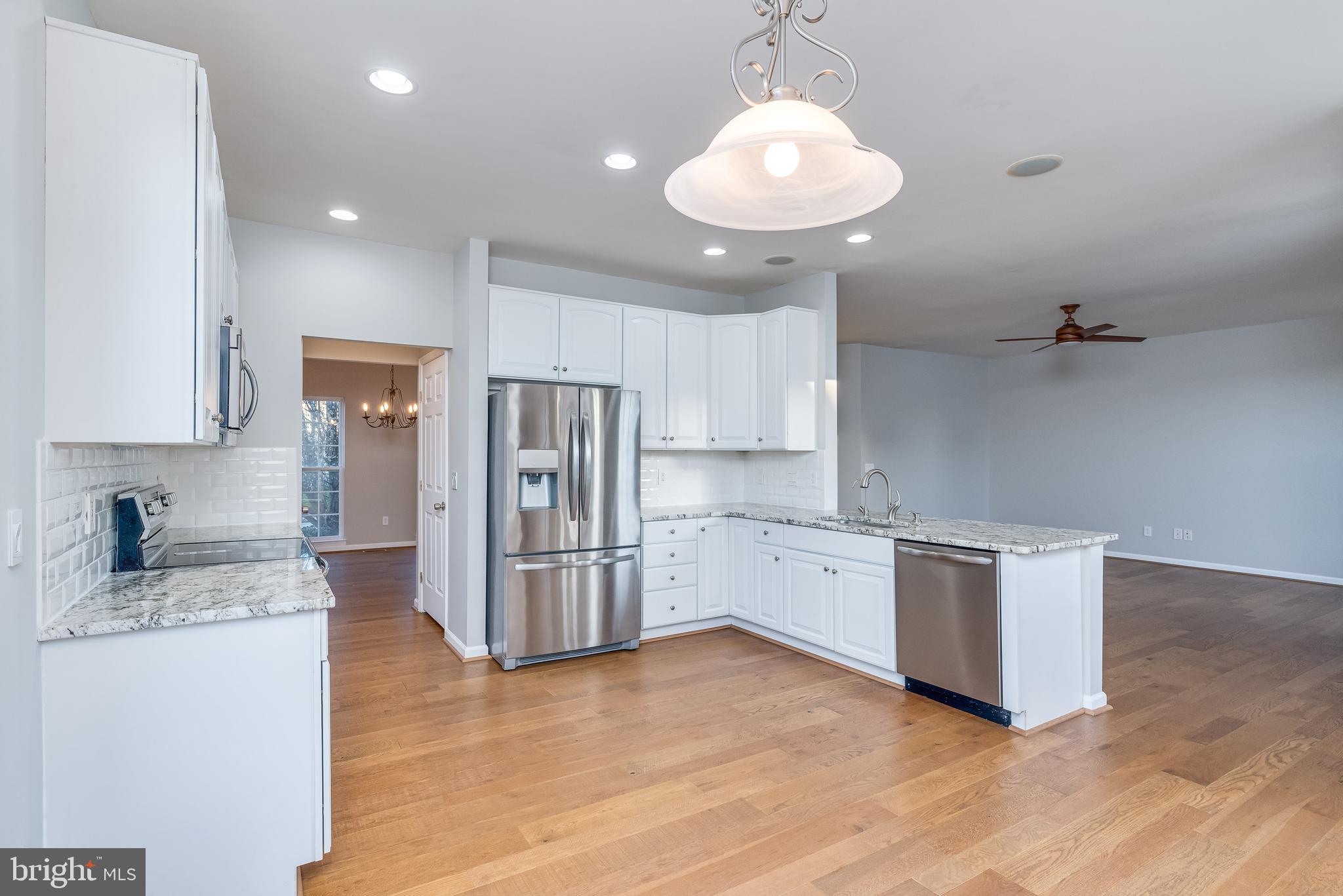 1357 North Fairfax Boulevard Ranson, WV 25438 - Photo 21 of 51 Kitchen opens into the formal dining room