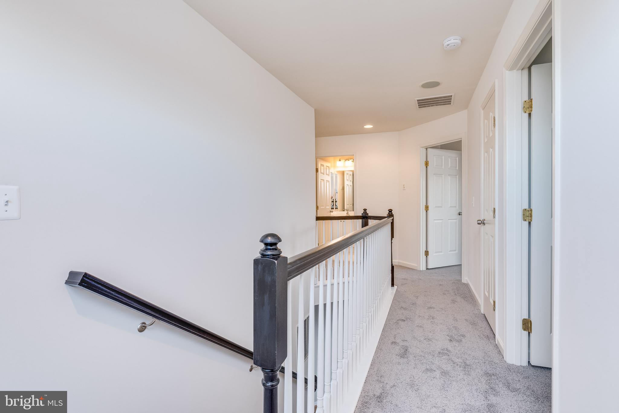 1357 North Fairfax Boulevard Ranson, WV 25438 - Photo 25 of 51 Upstairs you have a long, carpeted hallway