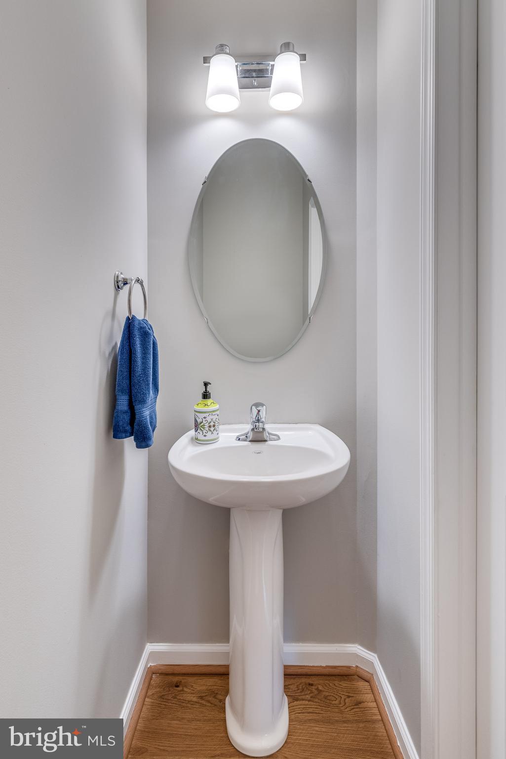 1357 North Fairfax Boulevard Ranson, WV 25438 - Photo 8 of 51 Features hardwood floors and pedestal sink