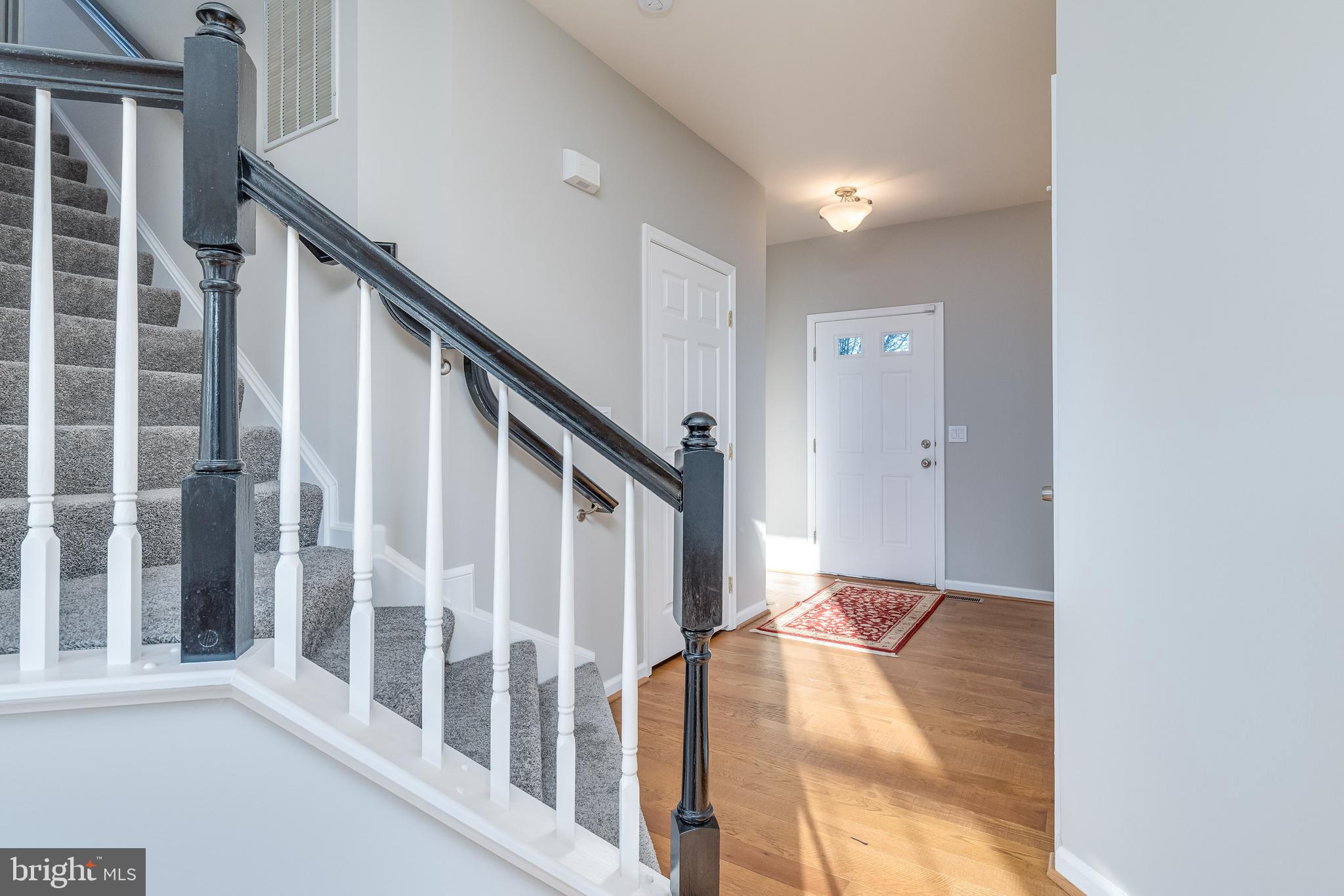 1357 North Fairfax Boulevard Ranson, WV 25438 - Photo 9 of 51 Beyond the stairs you have your large living room