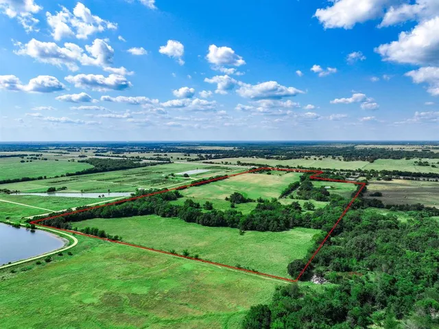 a view of a golf course with a lake