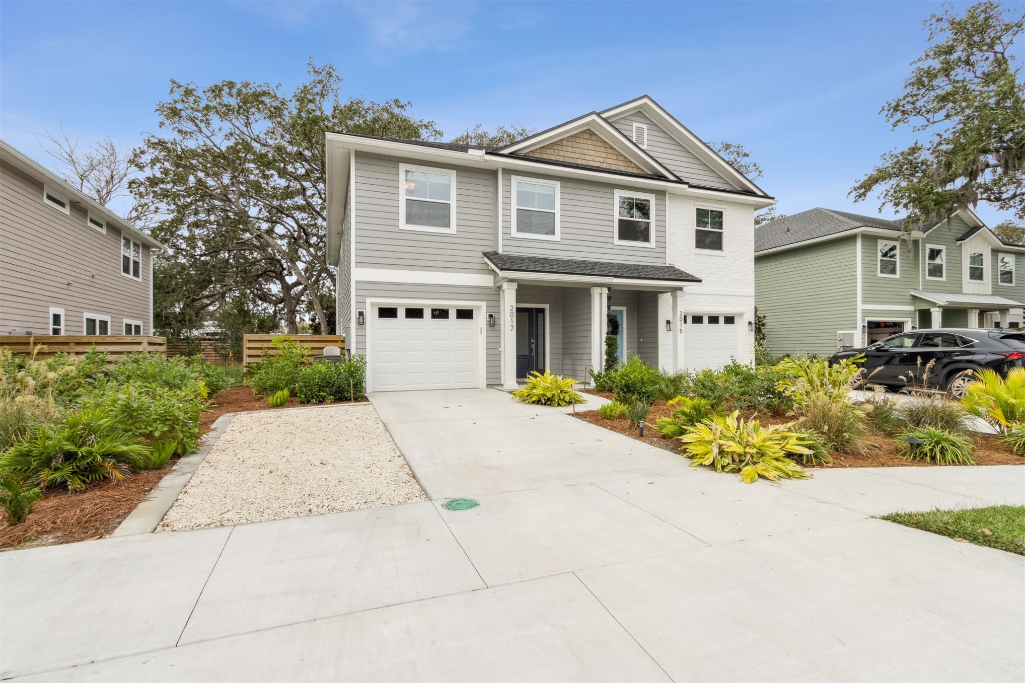 2017 Ryan Road Fernandina Beach, FL 32034 - Photo 1 of 39 a front view of a house with a yard and garage
