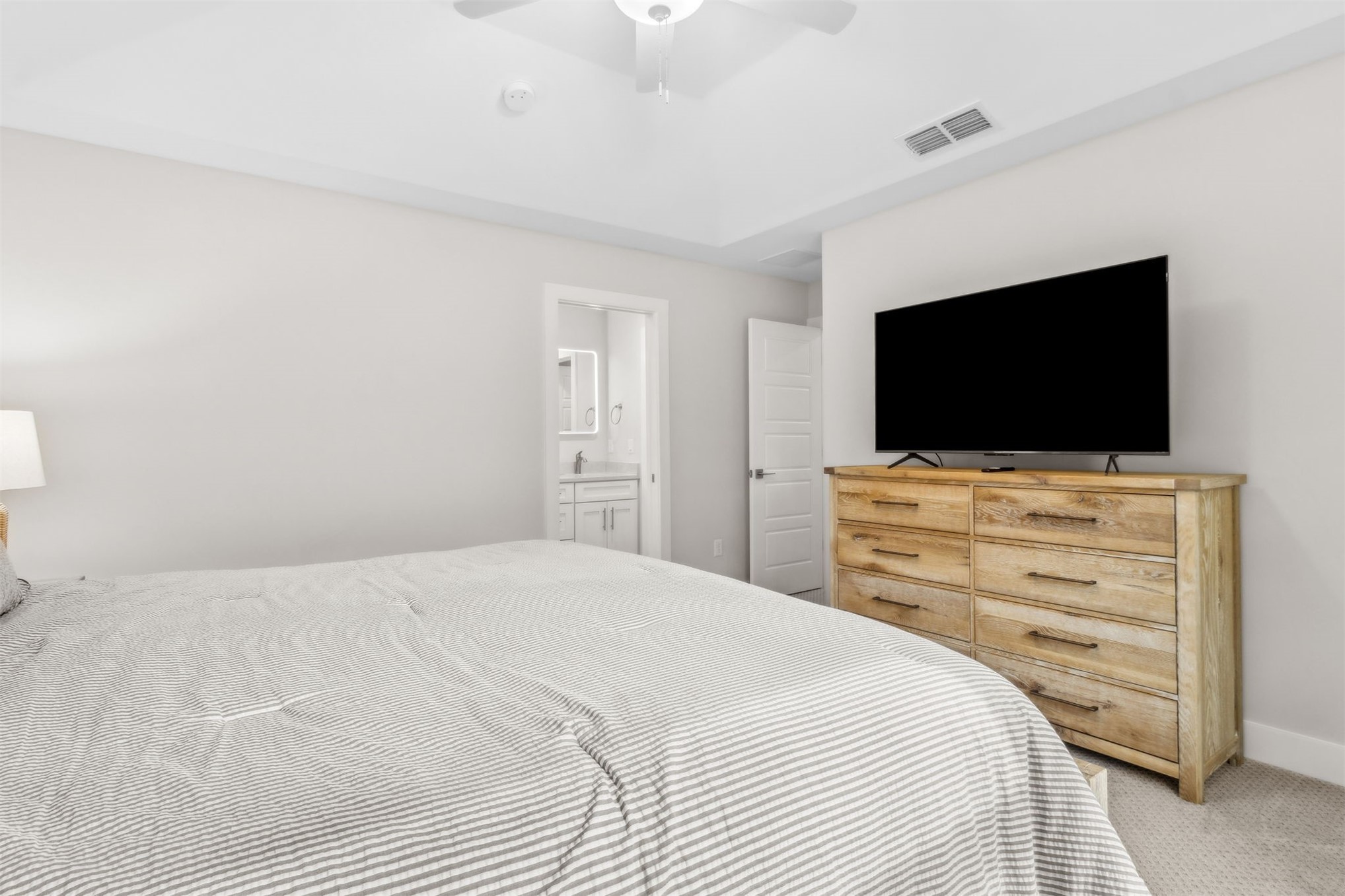 2017 Ryan Road Fernandina Beach, FL 32034 - Photo 15 of 39 a bedroom with a bed and a flat screen tv