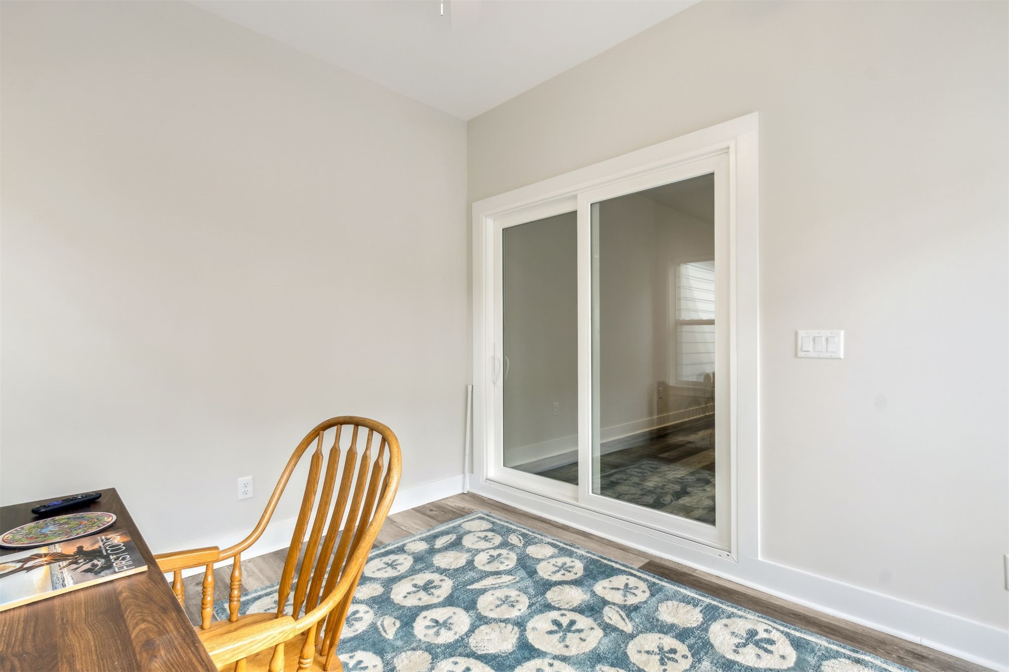 2017 Ryan Road Fernandina Beach, FL 32034 - Photo 27 of 39 a view of a hallway with wooden floor and a door